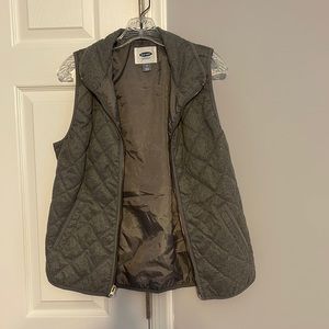 Gray vest.